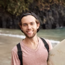 happy-young-surfer-snapback-looking-smiling-cheerfully-after-winning-sports-contest-surfers-holding-his-white-surfboard-his-arm_273609-1551